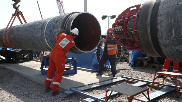 Công nhân tại công trường xây dựng đường ống dẫn khí Nord Stream 2 ở Kingisepp, Nga - Sputnik Việt Nam