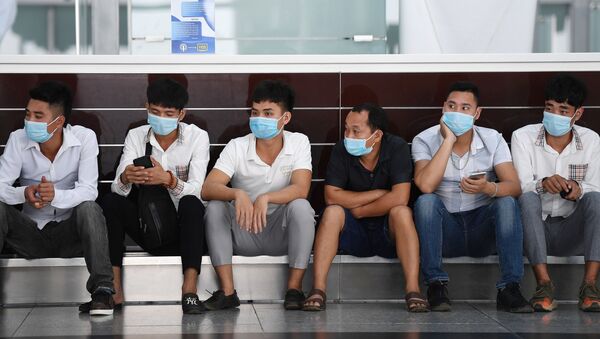Những người tại sân bay quốc tế Nội Bài, Hà Nội. - Sputnik Việt Nam