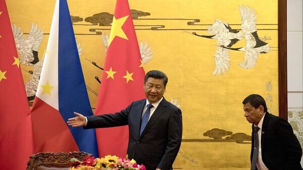 Chủ tịch Trung Quốc Tập Cận Bình và tổng thống Philippines Rodrigo Duterte tại Bắc Kinh - Sputnik Việt Nam