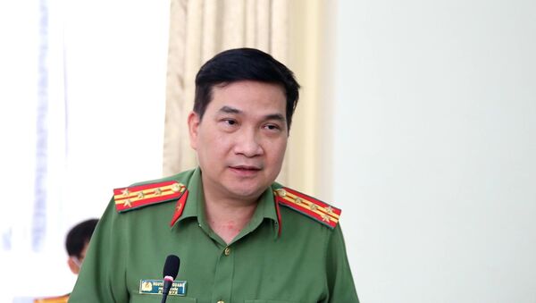 Đại tá Nguyễn Sỹ Quang, Phó Giám đốc Công an Thành phố Hồ Chí Minh trả lời câu hỏi của các cơ quan báo chí. - Sputnik Việt Nam