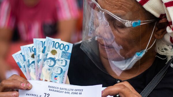 Phụ nữ Philippines nhận hỗ trợ tiền mặt từ chính phủ sau hai tuần cách ly - Sputnik Việt Nam