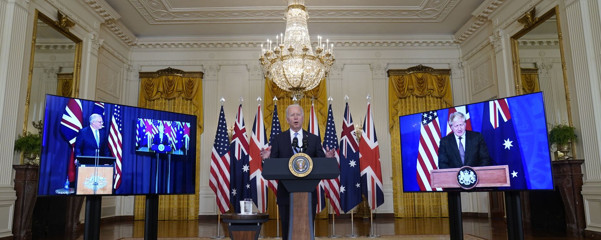 Tổng thống Joe Biden, Thủ tướng Úc Scott Morrison và Thủ tướng Anh Boris Johnson tại cuộc họp trực tuyến về sáng kiến ​​an ninh quốc gia mới của Hoa Kỳ hợp tác với Úc và Vương quốc Anh - Sputnik Việt Nam, 1920, 21.09.2021
