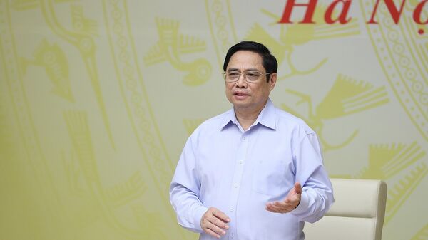 Thủ tướng Phạm Minh Chính chủ trì Hội nghị bàn giải pháp hỗ trợ doanh nghiệp trong bối cảnh dịch COVID-19 - Sputnik Việt Nam