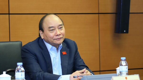 Chủ tịch nước Nguyễn Xuân Phúc, Đại biểu Quốc hội thành phố Hồ Chí Minh thảo luận ở tổ - Sputnik Việt Nam