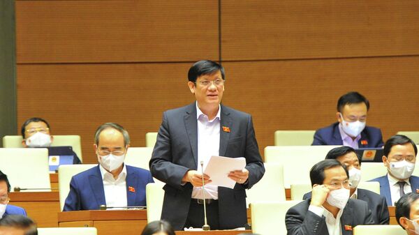 Bộ trưởng Bộ Y tế Nguyễn Thanh Long phát biểu giải trình, làm rõ một số vấn đề đại biểu Quốc hội nêu. - Sputnik Việt Nam