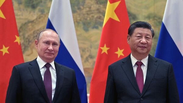 Tổng thống Nga Vladimir Putin và Chủ tịch Trung Quốc Tập Cận Bình trong cuộc gặp tại nhà khác quốc gia Diaoyutai ở Bắc Kinh - Sputnik Việt Nam