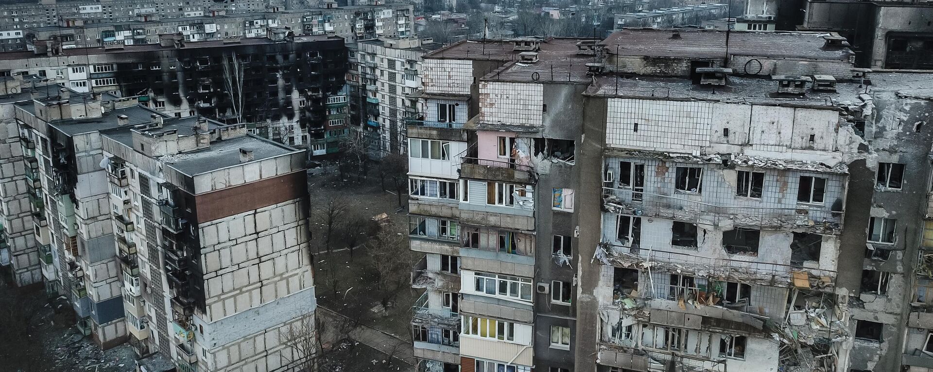 Những ngôi nhà bị phá hủy ở Mariupol. - Sputnik Việt Nam, 1920, 29.03.2022