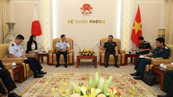 Thượng tướng Nguyễn Tân Cương tiếp Tham mưu trưởng Lực lượng Tự vệ trên không Nhật Bản - Sputnik Việt Nam