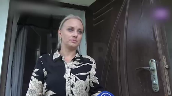 Người phụ nữ đã cứu sống đứa cháu 6 tuổi của mình trong trận pháo kích vào Donetsk của Lực lượng vũ trang Ukraina - Sputnik Việt Nam
