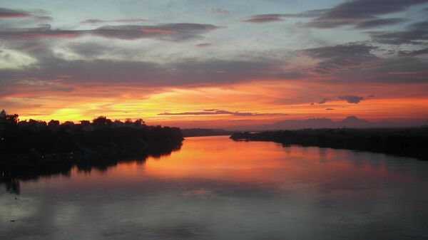 Закат на Красной реке во Вьетнаме - Sputnik Việt Nam