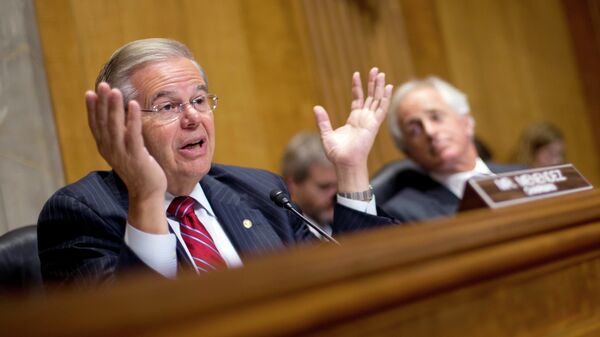 Chairman of the Senate Foreign Relations Committee, Sen. Robert Menendez, D-NJ., left, gestures as he speaks as ranking member Sen. Bob Corker, R-Tenn., sits right, during a hearing on Capitol Hill in Washington, Wednesday, July 9, 2014, to examine Russia and developments in Ukraine.  - Sputnik Việt Nam