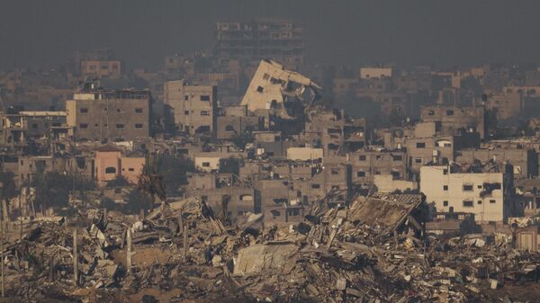 Các tòa nhà bị phá hủy do cuộc không kích của Israel ở phía bắc khu vực Gaza - Sputnik Việt Nam