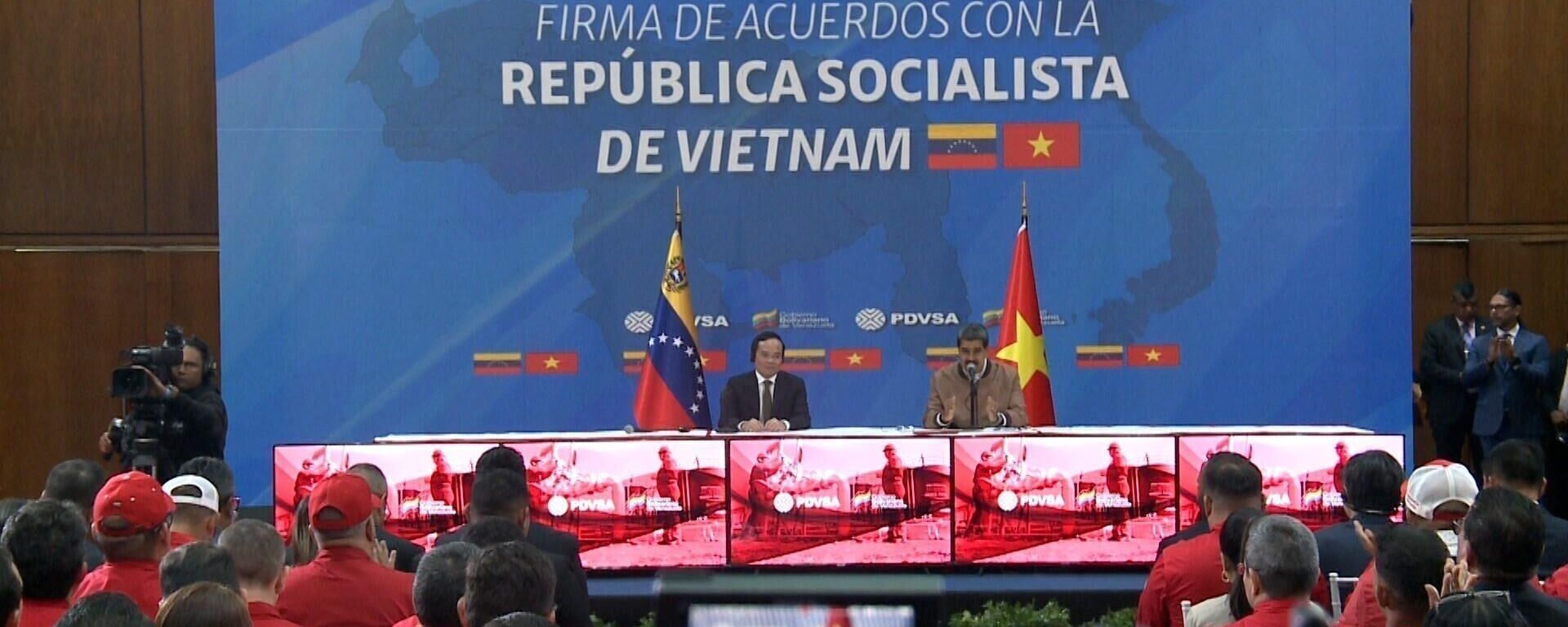Cuộc gặp giữa Phó Thủ tướng Trần Lưu Quang với Tổng Thống Maduro - Sputnik Việt Nam, 1920, 20.04.2024