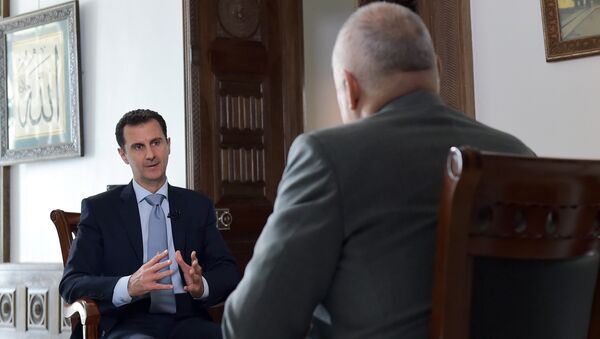 Tổng thống Syria Bashar Assad trả lời phỏng vấn độc quyền của ông Dmitry Kiselev (Rossiya Segodnya) - Sputnik Việt Nam
