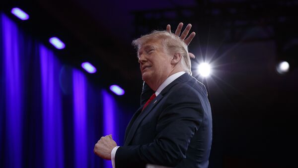 President Donald Trump gestures as he makes a joke about his hair during remarks to the Conservative Political Action Conference, Friday, Feb. 23, 2018, in Oxon Hill, Md. - Sputnik Việt Nam