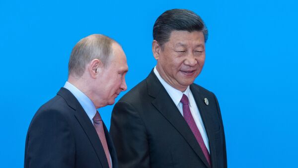 May 15, 2017. Russian President Vladimir Putin and Chinese President Xi Jinping, right, during the welcome ceremony for the heads of the delegations participating in the Belt and Road Forum, at the Yanqi Lake International Convention Center. - Sputnik Việt Nam