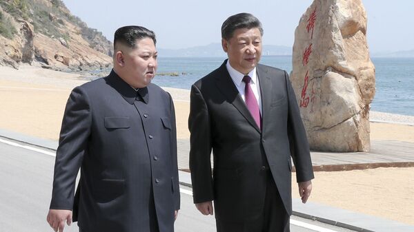 Chủ tịch CHND Trung Hoa Tập Cận Bình và lãnh đạo CHDCND Triều Tiên Kim Jong Un tại Bắc Kinh - Sputnik Việt Nam