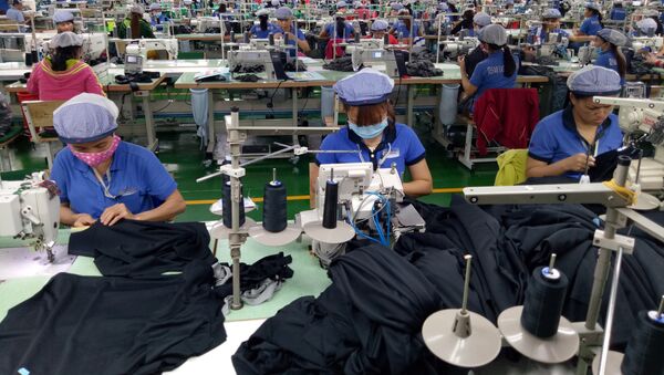 Sản xuất may mặc tại Công ty TNHH Far Eastern New Apparel Việt Nam - KCN Bắc Đồng Phú, tỉnh Bình Phước. - Sputnik Việt Nam