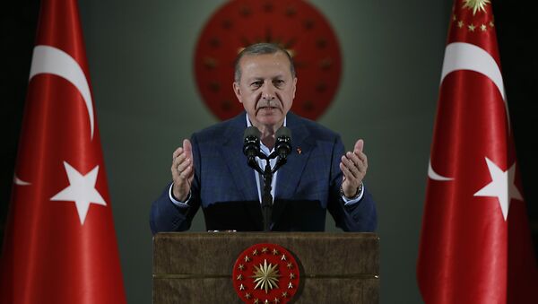 Turkey's President Recep Tayyip Erdogan speaks during an Iftar, the evening meal breaking the Ramadan fast, at his palace in Ankara, Turkey, Saturday, May 19, 2018 - Sputnik Việt Nam