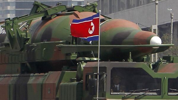 File photo, what appears to be a new missile is carried during a mass military parade at the Kim Il Sung Square in Pyongyang, North Korea, to celebrate the 100th anniversary of the country's founding father Kim Il Sung.  - Sputnik Việt Nam